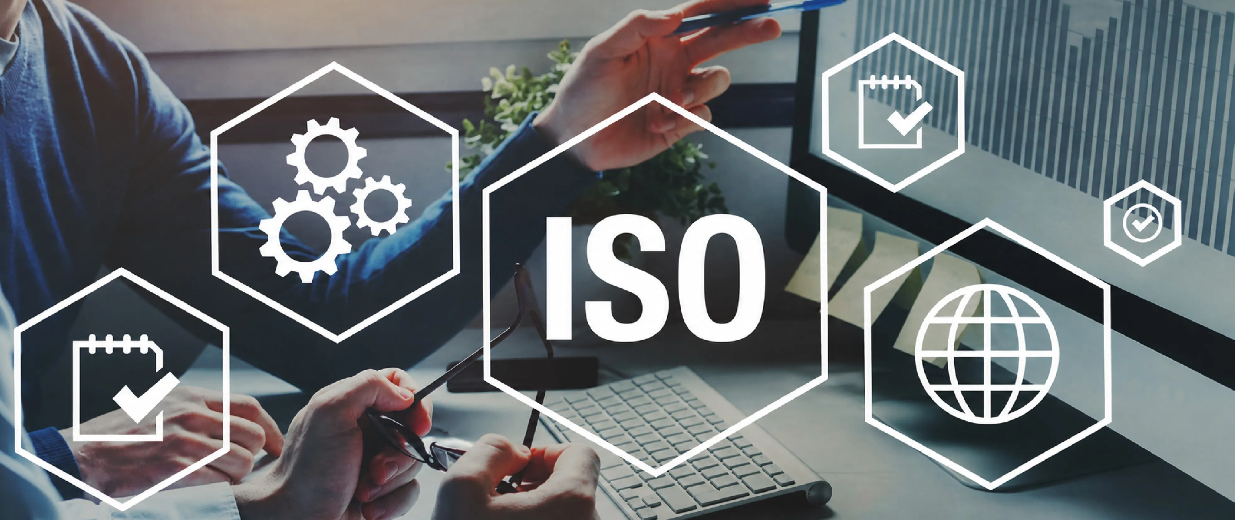 Business team discussing ISO standards and compliance management with quality assurance icons and digital dashboard.